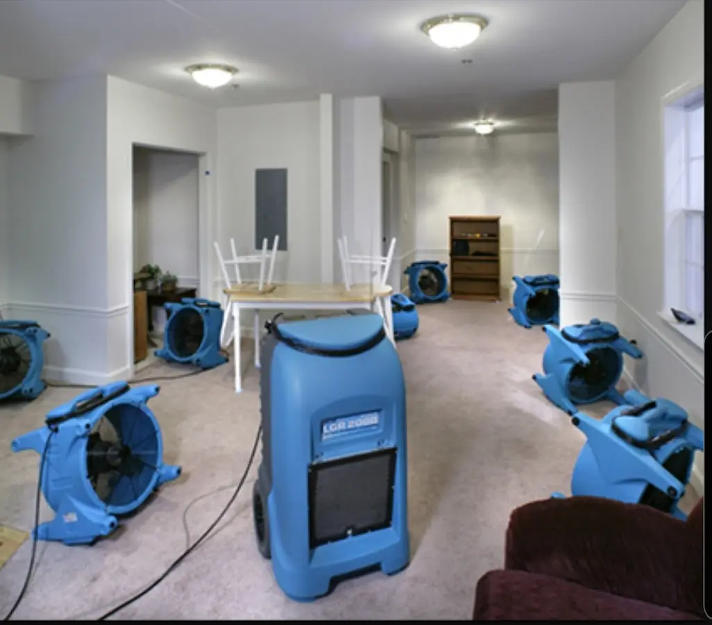 Air movers and dehumidifier setup for Water Extraction & Removal in Corcoran